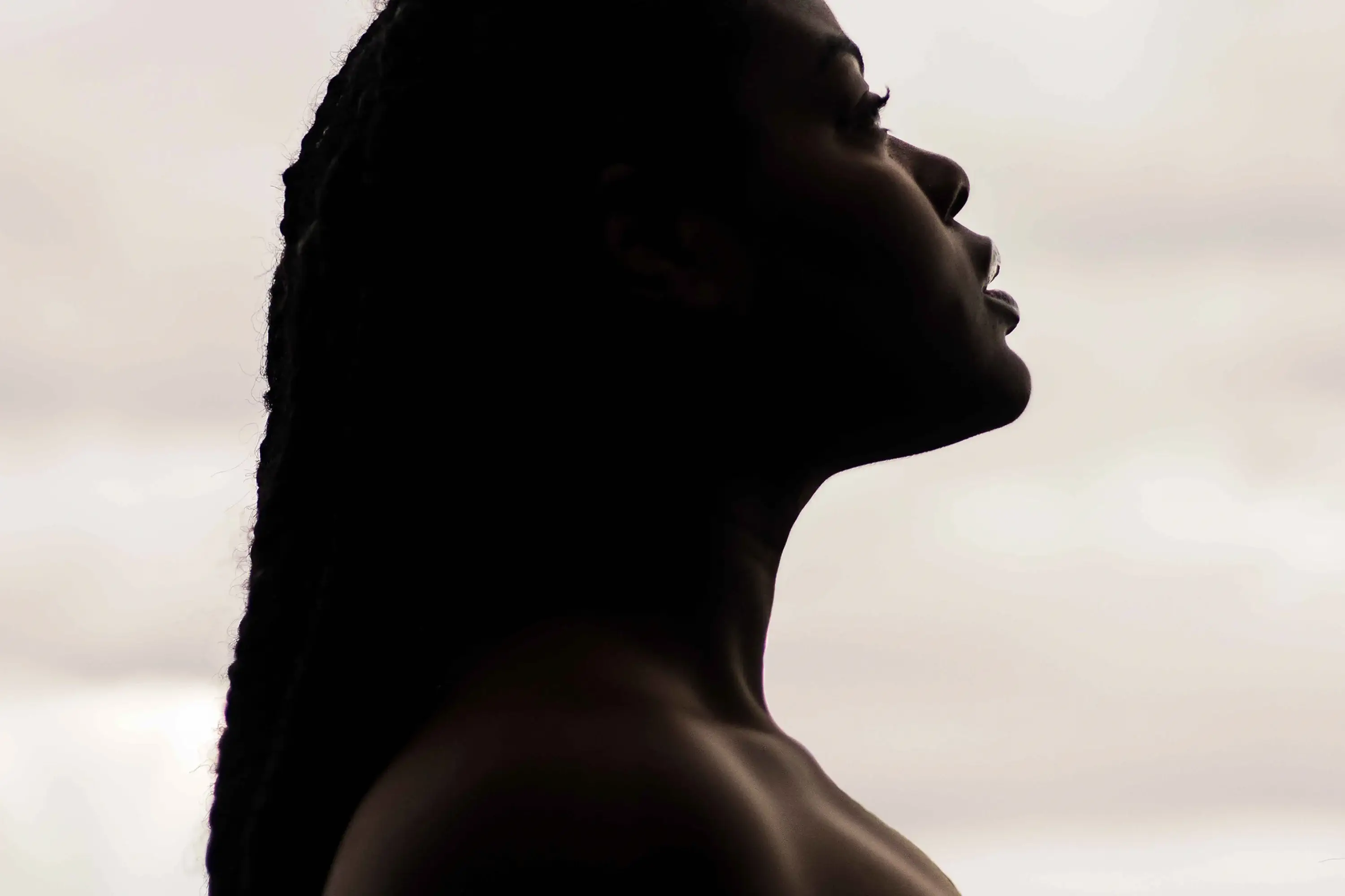 a woman looking up toward the sky 